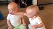Twin Baby Girls Fight Over Pacifier.