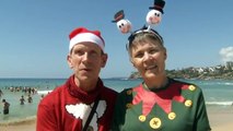 Tourists and locals enjoy Christmas Day on Bondi Beach