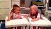 Twin babies engage in hysterical giggling fit