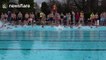 Icy Plunge for Christmas Swimmers