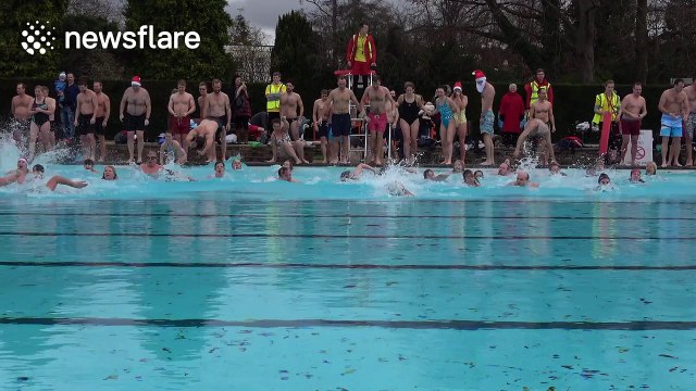 Icy Plunge for Christmas Swimmers