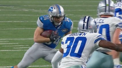 Zach Zenner corre para anotar un touchdown de 7 yardas