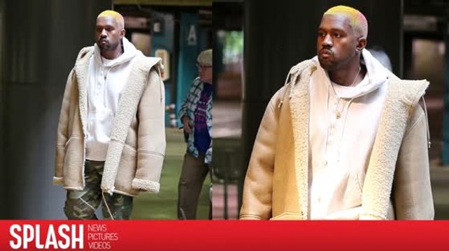 Kanye West Catches a Movie With Pink Hairdo