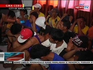 25 lalaki sa Naga City, Cebu, arestado matapos mahulihan ng mga baril at dalawang granada