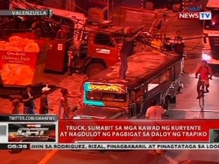 Truck, sumabit sa mga kawad ng kuryente at nagdulot ng pagbigat sa daloy ng trapiko