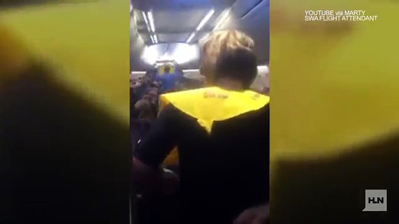 Watch - This flight attendant has 'em rolling in the aisles!-sPfya60FYo4