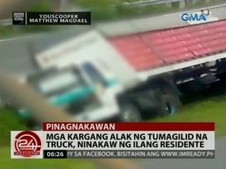 24 Oras: Mga kargang alak ng tumagilid na truck, ninakaw ng ilang residente