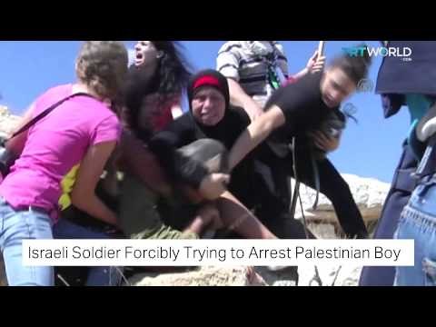 TRT World: Israeli soldier forcibly trying to arrest Palestinian boy