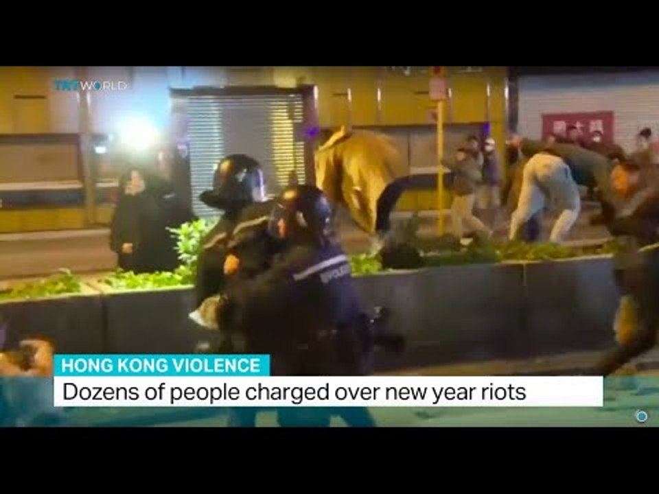 Dozens of people charged over new year riots in Hong Kong