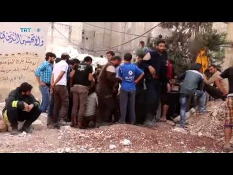 Dozens killed in Aleppo shelling and air raids, Iolo ap Dafydd reports