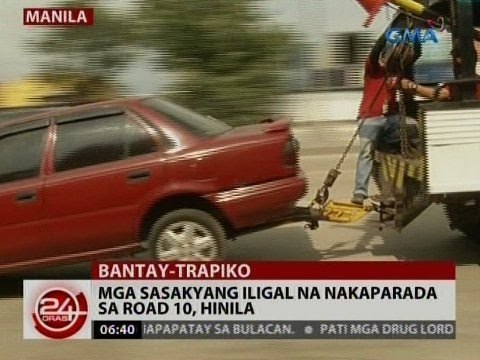 24 Oras: Mga sasakyang iligal na nakaparada sa Road 10, hinila