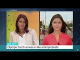 Rio 2016: Olympic torch arrives in Rio amid protests, Anelise Borges reports