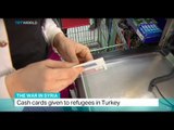 The War In Syria: Cash cards given to refugees in Turkey