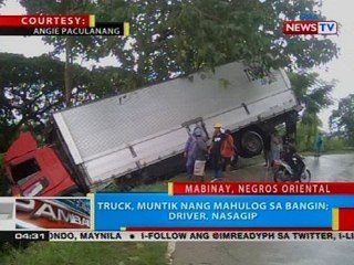 BP: Truck, muntik nang mahulog sa bangin; driver, nasagip