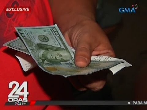 24 Oras: Taxi driver na binayaran ng pekeng dolyar ng pasahero, natangayan pa ng P1,500