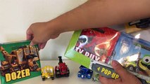 DinoTrux Books Gymboree PopUp Book Ty-Rux, TonTon, Dozer, Revvit Pop-Up Book Trailer FamilyToyReview