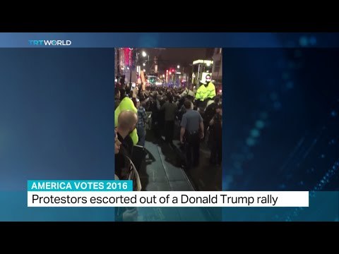 Protestors escorted out of Donald Trump rally
