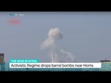 Activists say regime drops barrel bombs near Homs