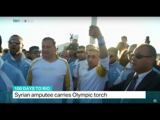 Syrian amputee carries Olympic torch