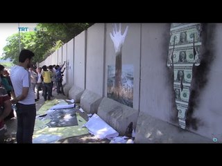 Artists turn Kabul's blast walls into canvasses, Jennifer Glasse reports