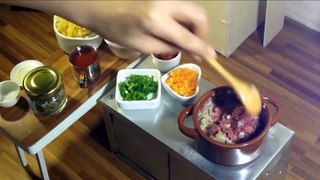 Making beef with red sauce by cooking Mini Japan