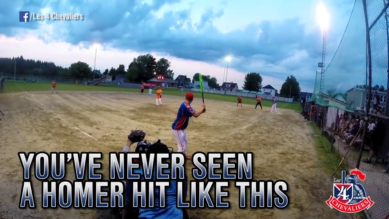 Softball player hits crazy backwards home run