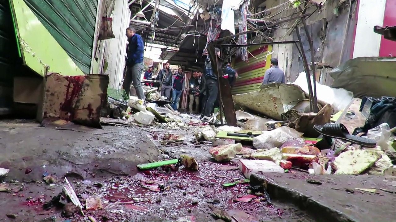 27 قتيلا على الاقل في اعتداء مزدوج باحد اسواق ب...