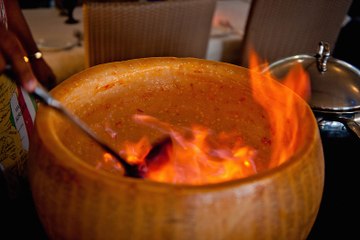 Cooking Pasta Inside a Grana Padano Cheese Wheel.
