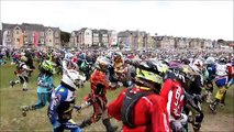 Racers compete in motocross race