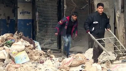 Syria army, civilians reclaim ruined Aleppo streets[1]