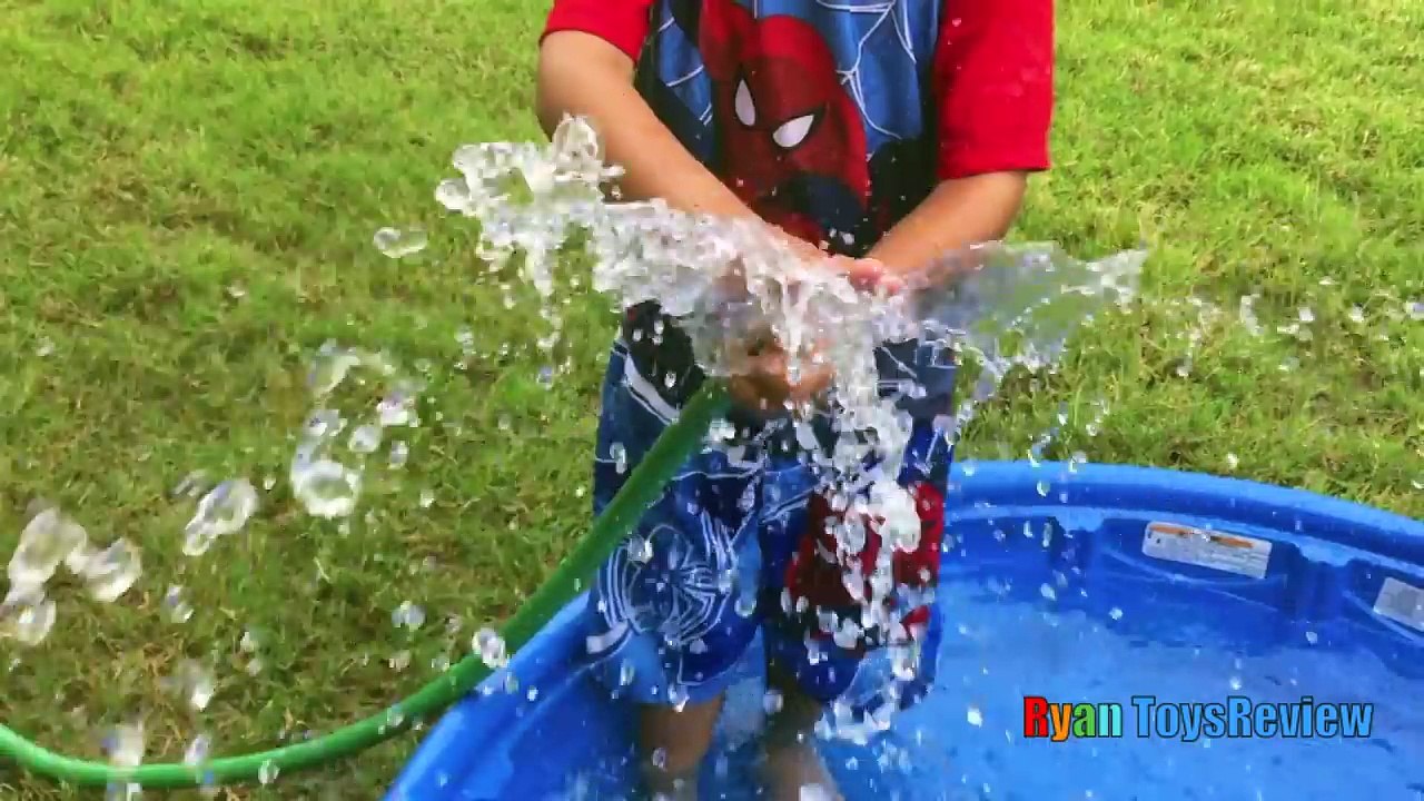 Playtime in Kiddie Pool Water Family Fun Water Gun Fight Surprise Toys Challenge Easter Egg Batman