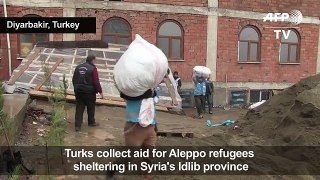 People in Turkey's Diyarbakir collect aid for Aleppo refugees