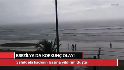 Video herunterladen: Sahildeki kadının başına yıldırım düşme anı