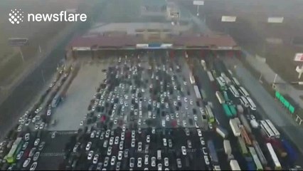 Thousands of cars stranded in traffic jam after New Year holiday in China