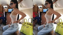 Kylie Jenner Flashes Bra in High-Cut Sheer Bodysuit