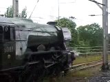 The No. 60103 'Flying Scotsman' wheel slip and rolls slower an half goes out his siding.