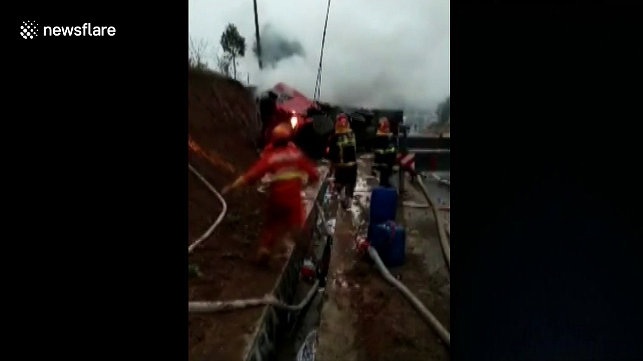 Driver rescued from overturned truck laden with exploding fireworks