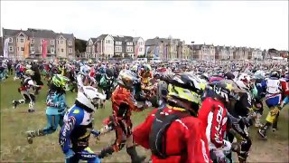 Racers compete in motocross race