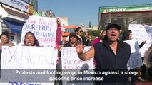 Protests and looting erupt in Mexico against gas price hike