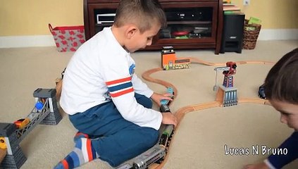 Lucas N Bruno Playing with wood trains