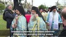 Istanbul's Orthodox Christians jump in icy water for Epiphany