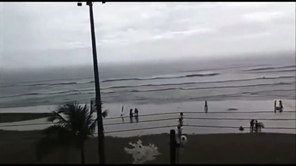 Exact Moment when Tourist is hit by lightning at a beach in Brazil