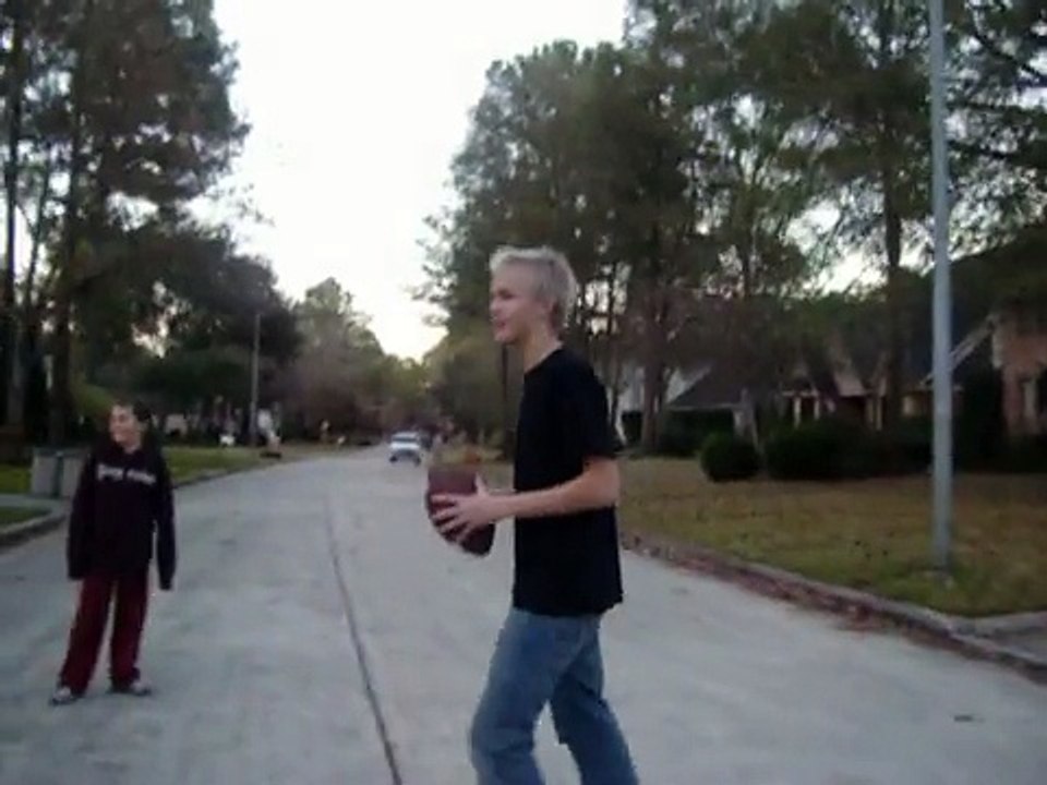 A girl getting hit by football