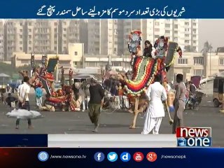 Karachi: People enjoy weather at Sea View