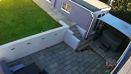 Is this Britains dumbest thief Caught on camera getting into the home of a CCTV engineer in broa