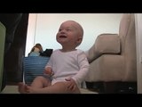 Baby Micah Laughing Hysterically at Laundry Basket