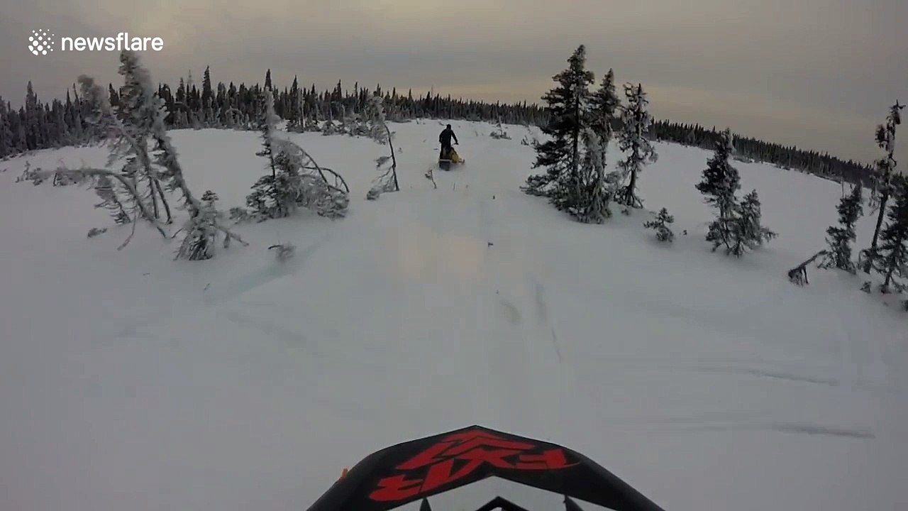 Snowmobile crash caught on GoPro