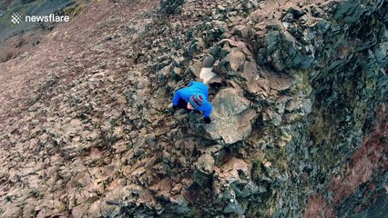 Daredevil speed-hikes across knife-edge ridge Crib Goch in Wales