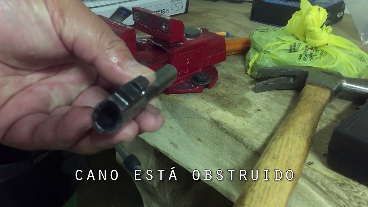 Projétil de chumbo no cano