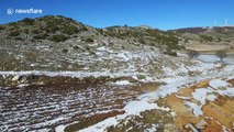 Aerial view of frozen lake in northern Greece